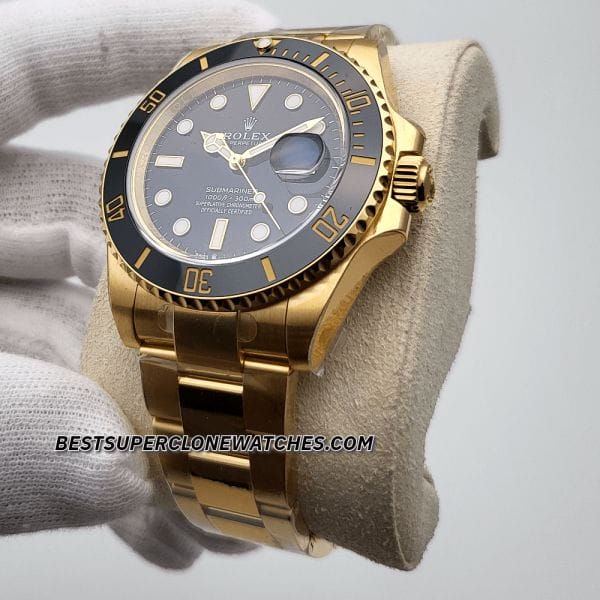 Detailed view of Rolex Submariner super clone in yellow gold with date window