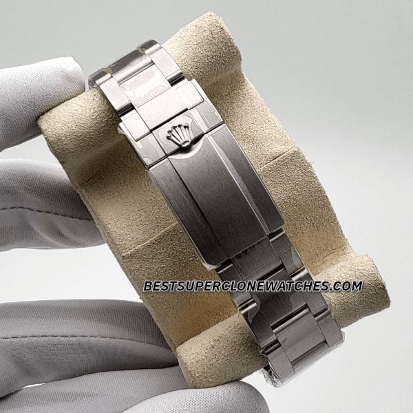 Fake Rolex Explorer II watch with Oystersteel case and iconic black dial with orange accents