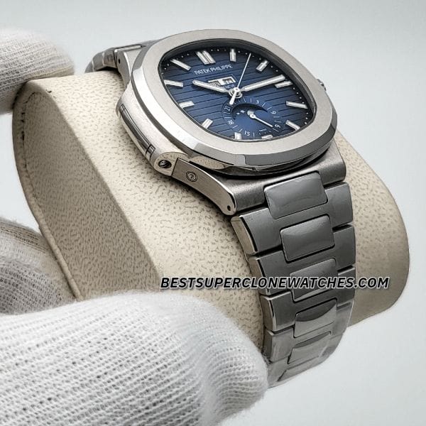 Fake Patek Philippe Nautilus watch showing moonphase and triple calendar display