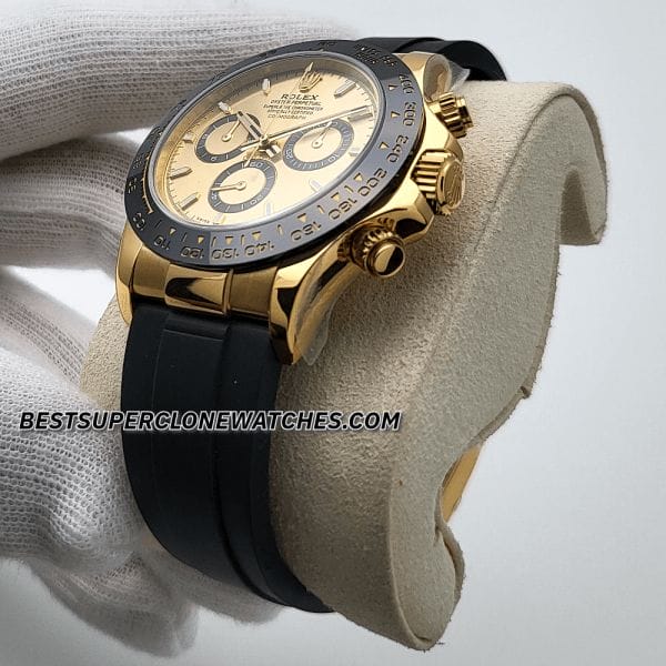 Close-up of Rolex Daytona super clone with golden dial and yellow gold case