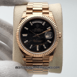 High-quality replica of Rolex Day-Date featuring rose gold case and diamonds on Eisenkiesel dial