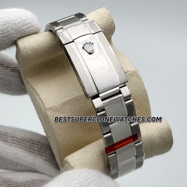 Replica Rolex Sky-Dweller 336934 with Oystersteel and white gold case, bright blue dial, and Jubilee bracelet