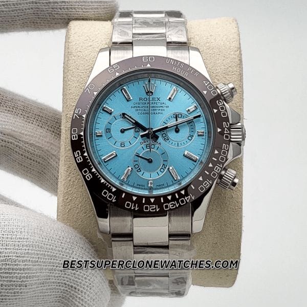 Replica Rolex Daytona with 4130 clone movement and platinum case featuring diamond-set ice blue dial