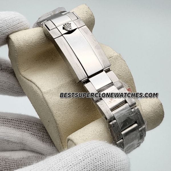 Luxury fake Rolex Daytona with platinum finish, diamond hour markers, and chronograph subdials