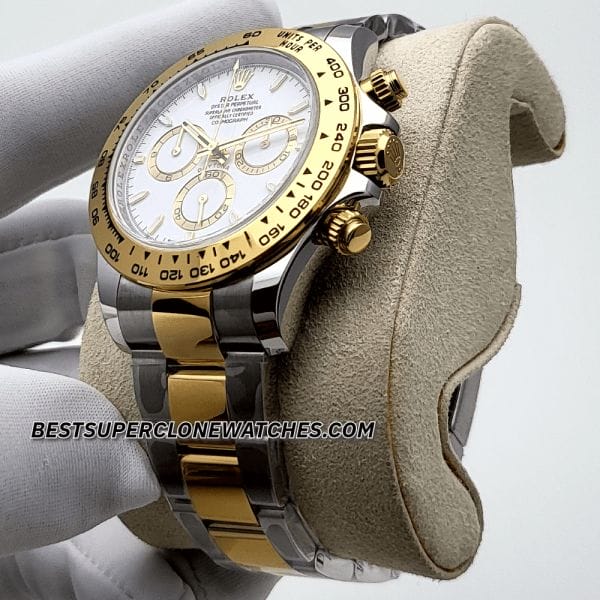 Replica Rolex Daytona with 4131 clone movement featuring two-tone yellow Rolesor and white dial