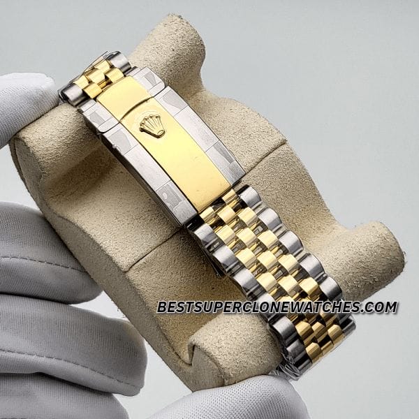 Close-up of the Rolex Datejust 3235 Swiss super clone, featuring a diamond-set champagne-colour dial with yellow gold and Oystersteel case.