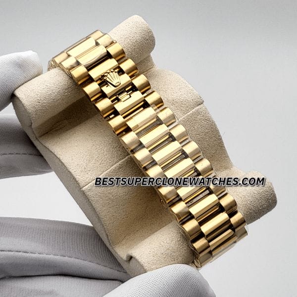 Luxury fake Rolex Day-Date 228238 with green dial and fluted yellow gold bezel
