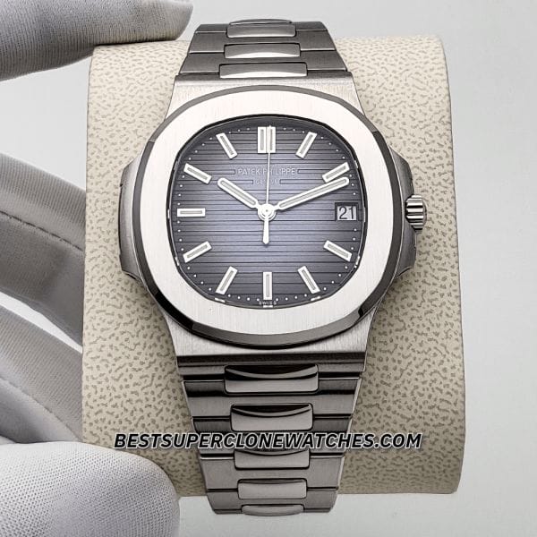 Super clone of Nautilus 5811/1G showing horizontal embossed blue dial and white gold tones