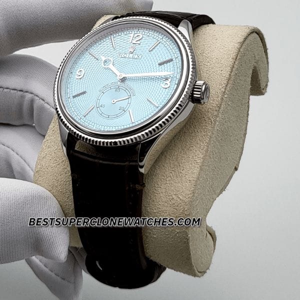Replica Rolex 1908 Platinum with ice blue dial and alligator strap, featuring 7140 movement clone