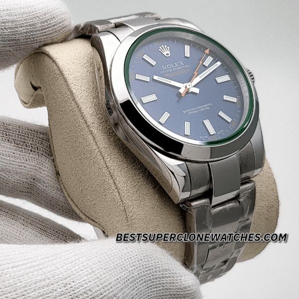 Close-up of fake Rolex Milgauss dial with orange lightning bolt second hand and blue finish