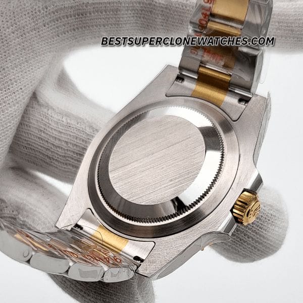 Detailed view of 126613LB replica Rolex with magnified date and luminous markers