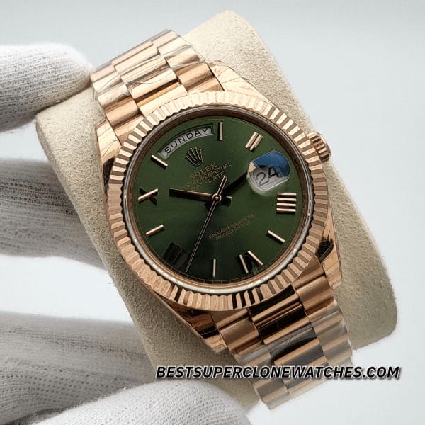 Luxury fake Rolex Day-Date 228235 featuring fluted Everose gold bezel and green dial