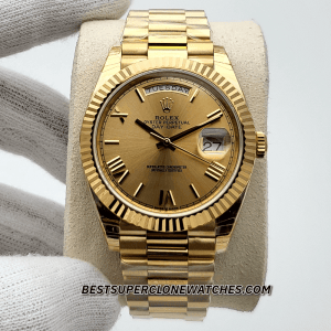 High-quality replica of Rolex Day-Date featuring champagne dial and fluted bezel