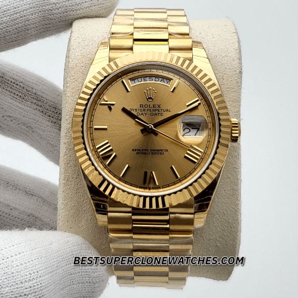 High-quality replica of Rolex Day-Date featuring champagne dial and fluted bezel