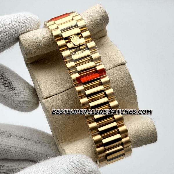 Luxury replica Rolex Day-Date 228238 in yellow gold with champagne dial and date window