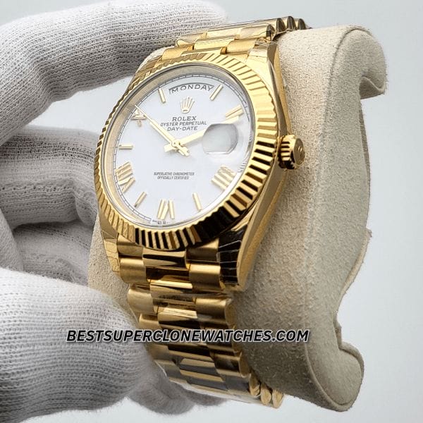 White dial Rolex Day-Date fake watch with roman numerals and gold hands