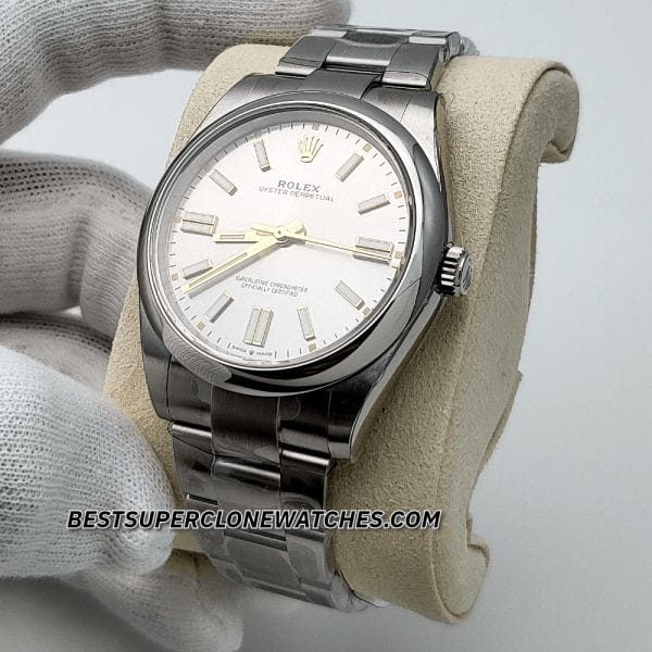 Fake Rolex Oyster Perpetual watch with sleek silver dial, luminous markers, and automatic 3230 movement imitation