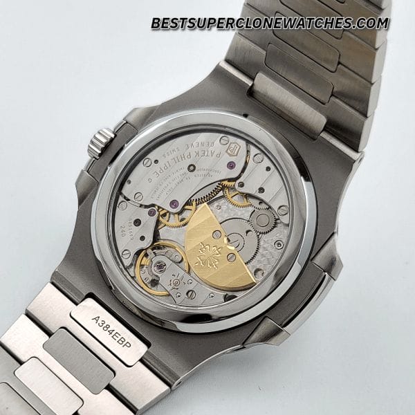 Replica Patek Philippe Nautilus with moon phase, power reserve, and black-blue dial