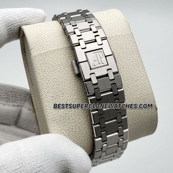 Super clone Royal Oak watch featuring black dial and iconic octagonal bezel with exposed screws