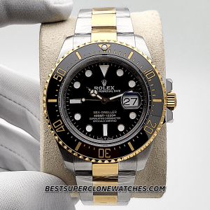 High-quality replica Rolex Sea-Dweller showing yellow gold bezel and robust Oystersteel case